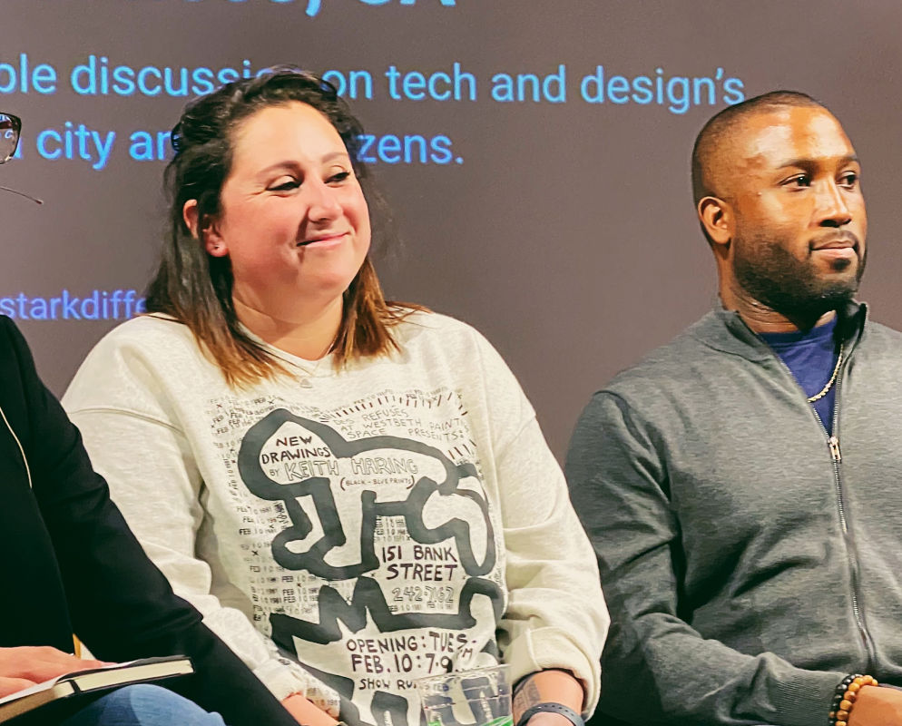 Panel members listening to a question from the audience